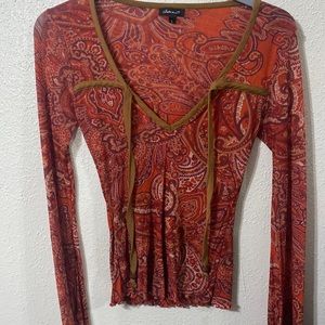 Vintage top
Color: Red with pattern
Size: Large